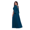 A woman modeling a floor-length teal blue dress with a back cutout and tie detail, shown from the back against a plain white background.