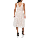 A woman shown from the back wearing a sleeveless lace midi dress with a V-neckline and black high-heeled sandals, against a plain white background.