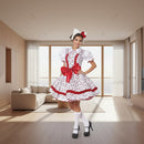 A woman modeling a white and red German-style Lolita costume dress with a large red bow at the waist, white puffed sleeves, a red floral print, a white collar, a matching white headpiece with a red bow, white knee socks, and black Mary Jane heels, against a plain white background.